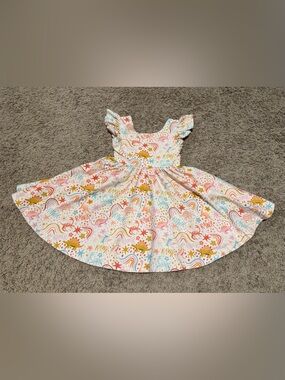 Ollie Jay pink dinosaur twirl dress